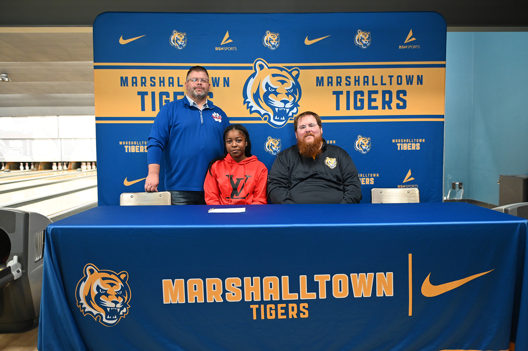 Camilla Thomas signing with coach